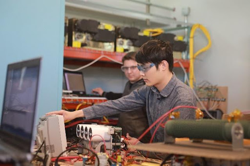 Interns testing batteries