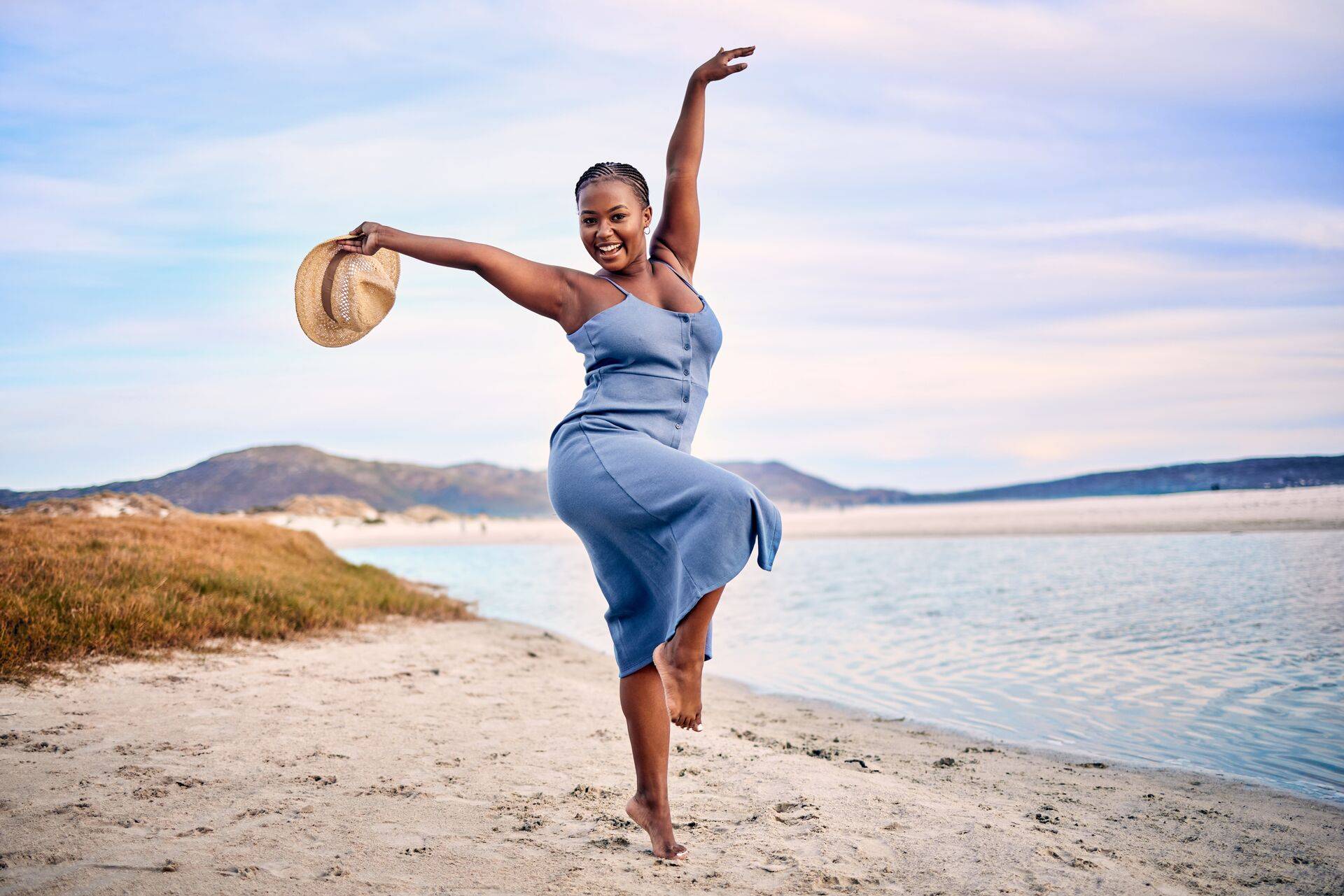 Woman dancing on the beach