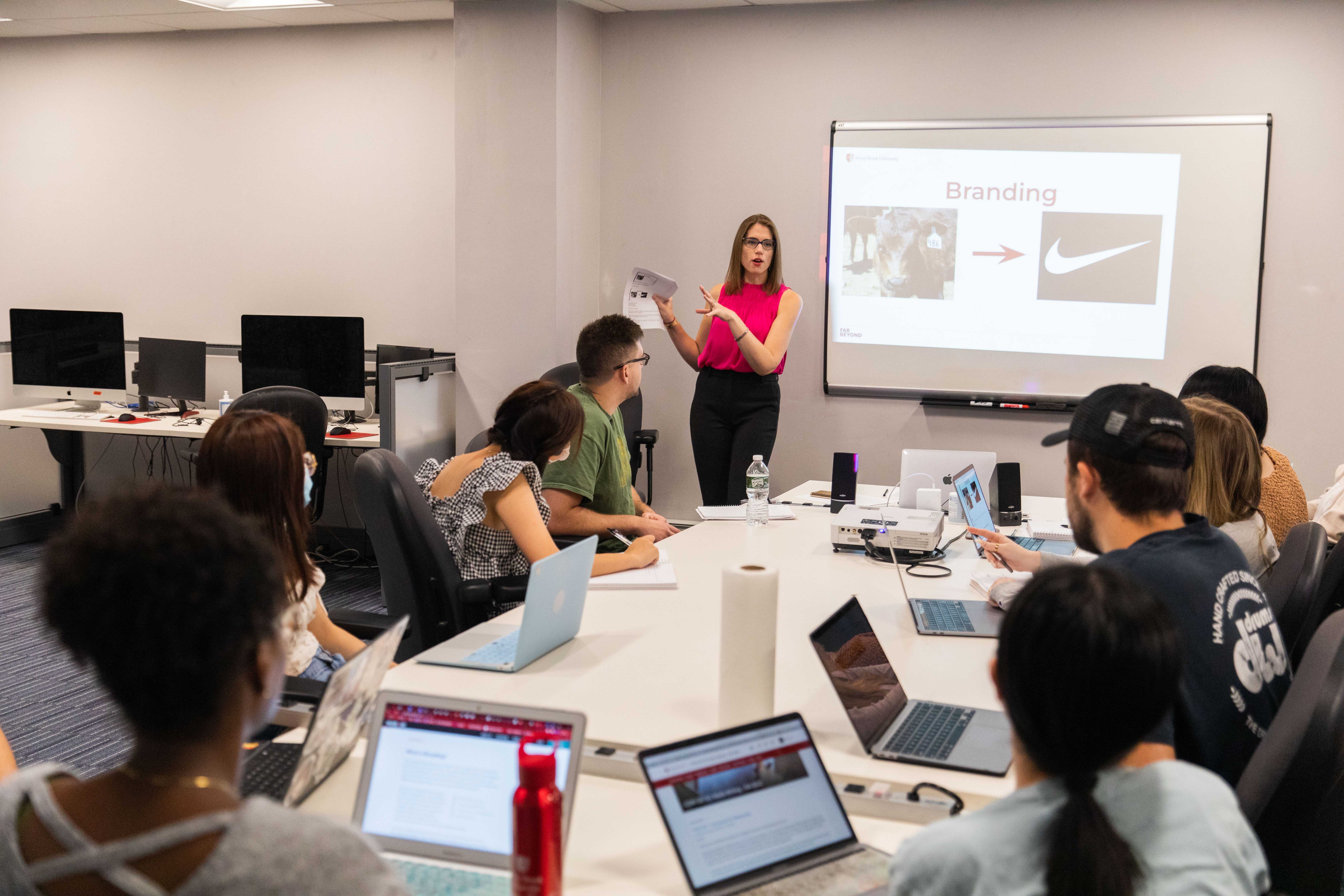 Students discuss branding in a class discussion